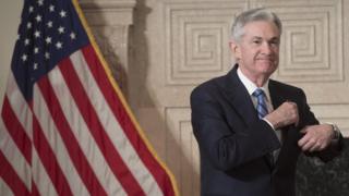 Jerome Powell arrives to takes the oath of office as he is sworn-in as the new Chairman of the Federal Reserve (FED) at the Federal Reserve Building in Washington, DC, February 5, 2018.