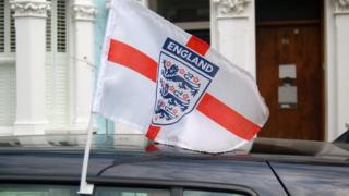 England flag attached to car