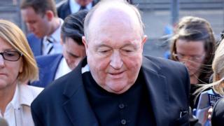Archbishop Philip Wilson leaves a court after his conviction in May