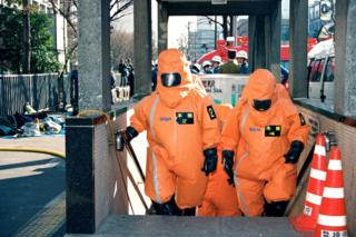 Tokyo Fire Department Haz-Mat team leave after decontamination work at Kasumigaseki Station