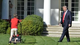 President Trump with boy mowing White House lawn