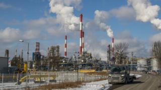 Smoking chimneys over the LOTOS refinery plant are seen in Gdansk, Poland on 1 March 2018