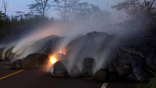 Volcanic gases rise from the Kilauea lava flow that crossed Pohoiki Road near Highway 132, near Pahoa, Hawaii, US on 28 May 2018