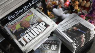 Front pages from New York City newspapers feature the then president-elect Donald Trump