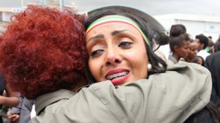 Relatives embrace after meeting at Asmara International Airport, after one arrived aboard the Ethiopian Airlines ET314 flight in Asmara, Eritrea July 18, 2018.