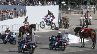 French republican guard motorcyclist doing a stunt