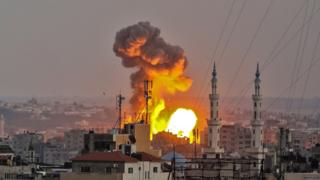 A picture taken on July 20, 2018 shows a fireball exploding in Gaza City during Israeli bombardment. Israeli aircraft and tanks hit targets throughout the Gaza Strip on July 20