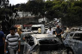 Burnt cars are seen following a wildfire at the village of Mati near Athens, Greece on 24 July 2018.