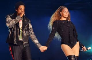 Jay-Z and Beyonce Knowles perform on stage during the 'On the Run II' tour opener in Cardiff, Wales