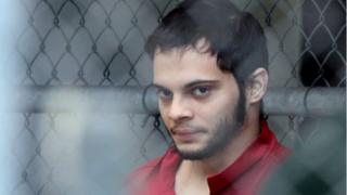 Esteban Santiago escorted from jail