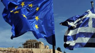 Greek and EU flags in Athens