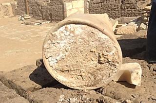 A broken jar containing a 3,200-year-old piece on cheese