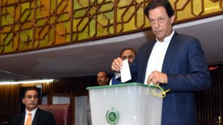Imran Khan casting his vote for the election of the Speaker of the House, in Islamabad, Pakistan, 15 August 2018.