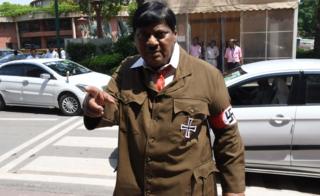 Naramalli Sivaprasad attends parliament dressed as Adolf Hitler on 9 August 2018 in Delhi.