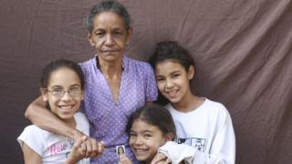 Maribel Pérez, 62, with her grandchildren (from left to right) Naile, 12, Naiberli, 7 and Naire, 13