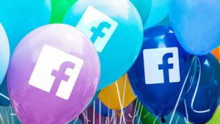 Facebook logo on balloons