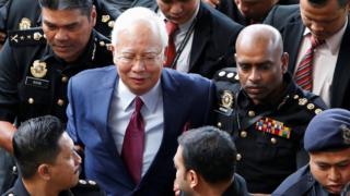 Mr Najib arriving in court on 4 July