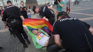 A demonstrator is detained by police during the LGBT community rally in central St. Petersburg, Russia on 4 August 2018