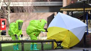 Experts at tent over the bench where where Sergei Skripal and his daughter Yulia were found on March 4, 2018