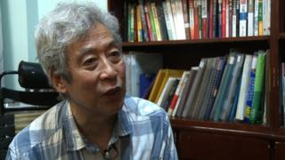 Screen grab taken from AFP video footage shows former professor Sun Wenguang talking in his home in Jinan, 2013