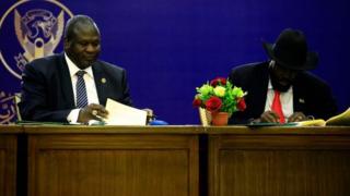Riek Machar and Salva Kiir sign a power-sharing agreement