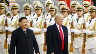 US President Donald Trump and China's President Xi Jinping at a ceremony in China