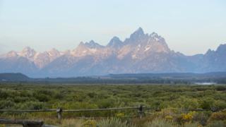 The sun rises over Grand Teton National Park on August 21, 2017 outside Jackson, Wyoming.