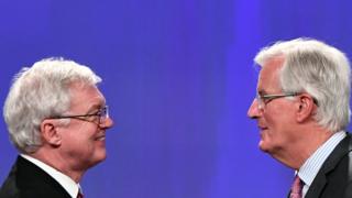 UK Brexit Secretary David Davis and Chief EU Negotiator Michel Barnier face each other