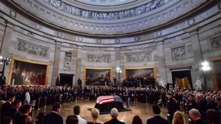 Former Senator John McCain lies in state in the Capitol Rotunda at the US Capitol in Washington DC on 31 August 2018