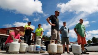 Customers line up to buy propane at Socastee Hardware store, ahead of the arrival of Hurricane Florence in Myrtle Beach, South Carolina