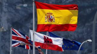 Spanish, British, EU and Gibraltarian flags