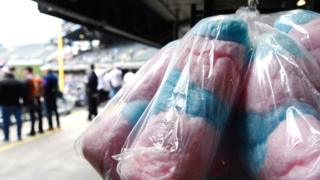 Blue and pink candy floss in bags