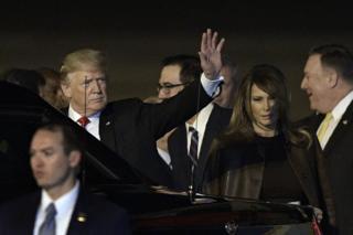 US President Donald Trump (L) and US First Lady Melania Trump after arrival at Ezeiza International airport in Buenos Aires province, 29 November (local time) 2018