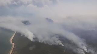 An aerial view of smoke from a bushfire in Queensland