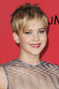 Just in time for the release of The Hunger Games, Hollywood star Jennifer Lawrence chopped off her long locks into a textured pixie crop.
