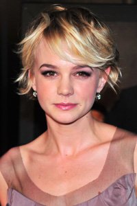 Try Carey Mulligan ’s short layered blonde crop. Flattering for all face shapes