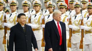 US President Donald Trump takes part in a welcoming ceremony with China's President Xi Jinping on 9 November, 2017 in Beijing, China.