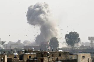 Smoke rises above Sanaa, Yemen following a Saudi-led coalition air strike targeting a Houthi rebel position (31 August 2016)