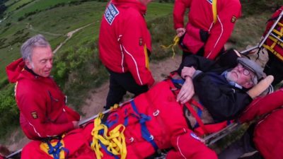 Yorkshire pensioner carried up to summit through rescue staff