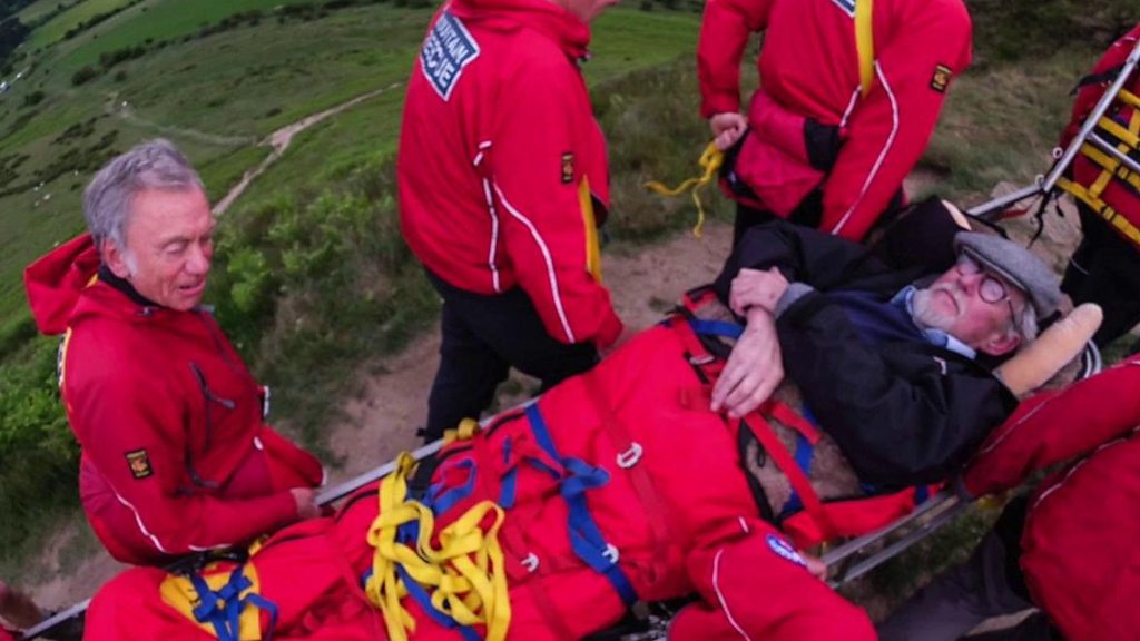 Yorkshire pensioner carried up to summit through rescue staff