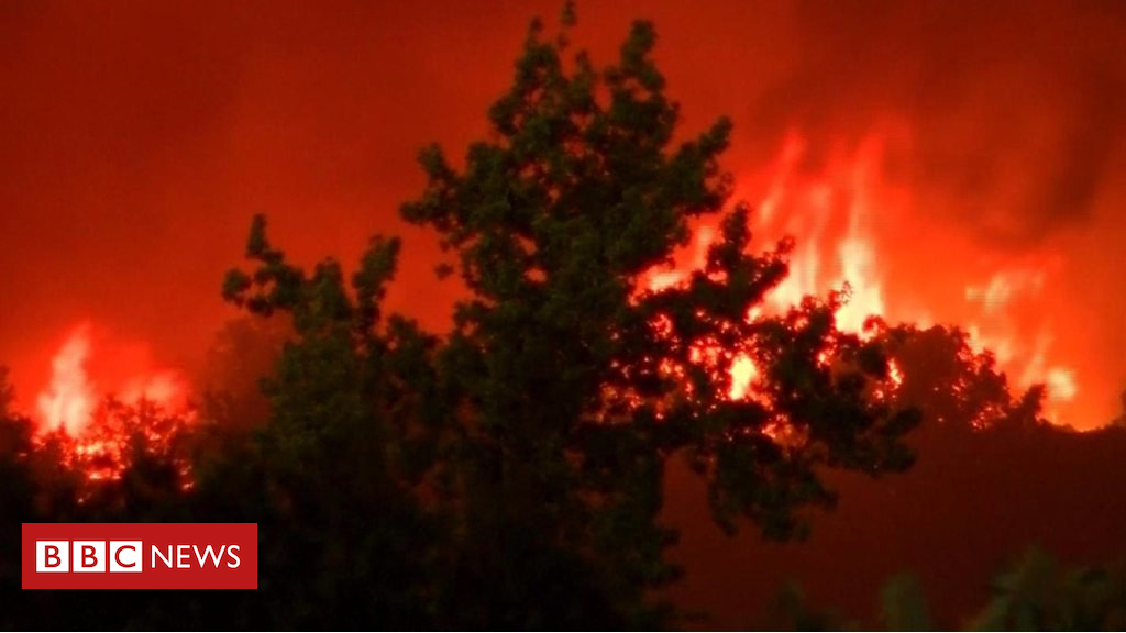 California wildfire tears via properties