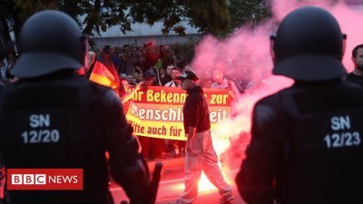 Germany migrants: Protests in Chemnitz end in violence