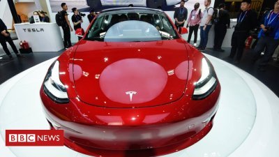 Tesla to curb hundreds of jobs in profitability force