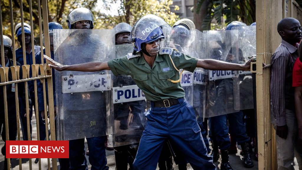 In photos: Zimbabwe election protesters conflict with police