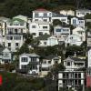 New Zealand bans sales of houses to foreigners