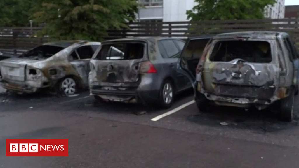 Swedish gangs set EIGHTY automobiles on hearth in numerous towns