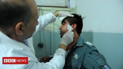 Afghanistan warfare: Bombers kill 20 at Kabul sports club