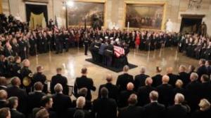 George HW Bush lies in state at US Capitol