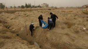 Syria battle: 'Seven mass graves found' in former IS stronghold