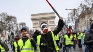 'Yellow-vest' protesters defy government to gather in Paris